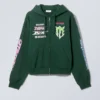 Boxy Graphic Zip Hoodie – Multi-Printed Dark Green Boxy Graphic Zip Hoodie – Multi-Printed Dark Green