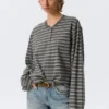 Boxy Long-Sleeved Henley T-Shirt – Striped Dark Grey Boxy Long-Sleeved Henley T-Shirt – Striped Dark Grey