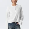 Boxy Long-Sleeved Henley T-Shirt – White Boxy Long-Sleeved Henley T-Shirt – White