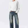 Boxy Long-Sleeved Henley T-Shirt – White Boxy Long-Sleeved Henley T-Shirt – White