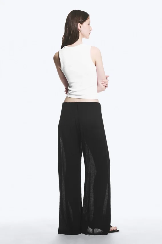 Crinkled Low-Rise Wide-Leg Trousers – Black Crinkled Low-Rise Wide-Leg Trousers – Black
