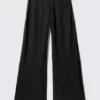 Crinkled Low-Rise Wide-Leg Trousers – Black Crinkled Low-Rise Wide-Leg Trousers – Black