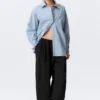 Cross-Buttoned Long-Sleeved Cotton Shirt – Light Blue Cross-Buttoned Long-Sleeved Cotton Shirt – Light Blue