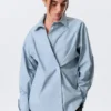 Cross-Buttoned Long-Sleeved Cotton Shirt – Light Blue Cross-Buttoned Long-Sleeved Cotton Shirt – Light Blue