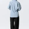 Cross-Buttoned Long-Sleeved Cotton Shirt – Light Blue Cross-Buttoned Long-Sleeved Cotton Shirt – Light Blue
