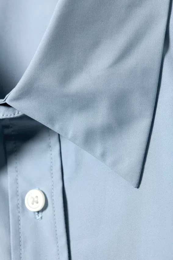 Cross-Buttoned Long-Sleeved Cotton Shirt – Light Blue Cross-Buttoned Long-Sleeved Cotton Shirt – Light Blue