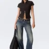 Fitted Short-Sleeved Zip Top – Striped Black Fitted Short-Sleeved Zip Top – Striped Black