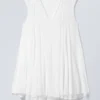 Flowy V-Neck Mini Dress – White Flowy V-Neck Mini Dress – White