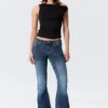 Katsumi Low Rise Slim Flared Leg Jeans – Peak Blue – Medium Blue Katsumi Low Rise Slim Flared Leg Jeans – Peak Blue – Medium Blue