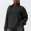 Long-Sleeved Boxy Cotton T-Shirt – Striped Black Long-Sleeved Boxy Cotton T-Shirt – Striped Black