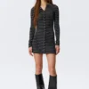 Long-Sleeved Popper Mini Dress – Striped Black Long-Sleeved Popper Mini Dress – Striped Black