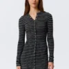 Long-Sleeved Popper Mini Dress – Striped Black Long-Sleeved Popper Mini Dress – Striped Black