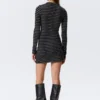 Long-Sleeved Popper Mini Dress – Striped Black Long-Sleeved Popper Mini Dress – Striped Black