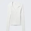 Long-Sleeved Ribbed Knit V-Neck Top – White Long-Sleeved Ribbed Knit V-Neck Top – White