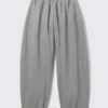 Loose Cutline Cotton Fleece Sweatpants – Grey Melange Loose Cutline Cotton Fleece Sweatpants – Grey Melange