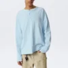 Loose Long-Sleeved Henley T-Shirt – Light Blue Loose Long-Sleeved Henley T-Shirt – Light Blue