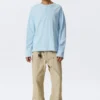 Loose Long-Sleeved Henley T-Shirt – Light Blue Loose Long-Sleeved Henley T-Shirt – Light Blue