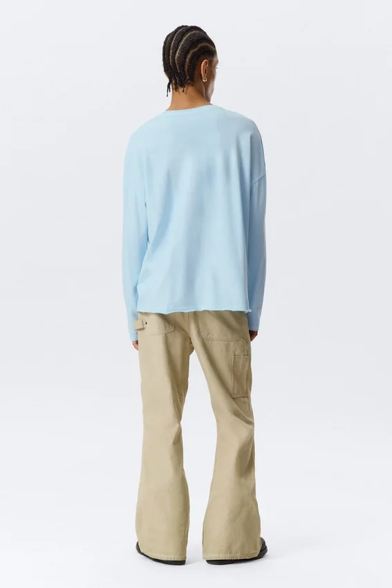 Loose Long-Sleeved Henley T-Shirt – Light Blue Loose Long-Sleeved Henley T-Shirt – Light Blue