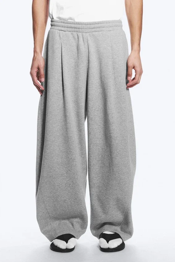 Loose Pleated Sweatpants – Grey Melange Loose Pleated Sweatpants – Grey Melange