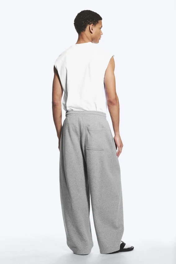 Loose Pleated Sweatpants – Grey Melange Loose Pleated Sweatpants – Grey Melange