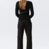 Low-Rise Flared Suiting Trousers – Pinstriped Black Low-Rise Flared Suiting Trousers – Pinstriped Black