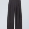 Low Rise Loose Pleated Suiting Trousers – Dark Grey Melange Low Rise Loose Pleated Suiting Trousers – Dark Grey Melange