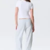 Low-Rise Relaxed Pull-On Trousers – White – Blue Stripes Low-Rise Relaxed Pull-On Trousers – White – Blue Stripes