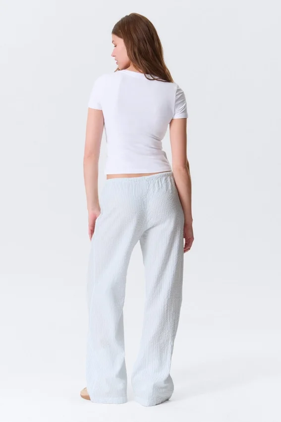 Low-Rise Relaxed Pull-On Trousers – White – Blue Stripes Low-Rise Relaxed Pull-On Trousers – White – Blue Stripes