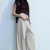 Low Rise Wide Leg Pleated Trousers – Light Mole Low Rise Wide Leg Pleated Trousers – Light Mole