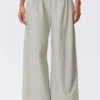 Low Rise Wide Leg Pleated Trousers – Light Mole Low Rise Wide Leg Pleated Trousers – Light Mole