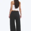 Low-Waisted Loose Fit Suit Trousers – Pinstriped Black Low-Waisted Loose Fit Suit Trousers – Pinstriped Black