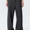 Low-Waisted Loose Fit Suit Trousers – Pinstriped Dark Grey Low-Waisted Loose Fit Suit Trousers – Pinstriped Dark Grey