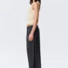 Low-Waisted Loose Fit Suit Trousers – Pinstriped Dark Grey Low-Waisted Loose Fit Suit Trousers – Pinstriped Dark Grey