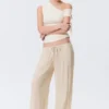 Mid Rise Loose Flounce Trousers – Light Beige Mid Rise Loose Flounce Trousers – Light Beige