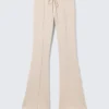 Mid Rise Pintuck Flared Sweatpants – Light Beige Mid Rise Pintuck Flared Sweatpants – Light Beige