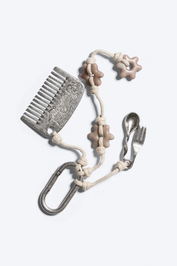 Multi Charm Keyring – Beige/Silver Multi Charm Keyring – Beige/Silver