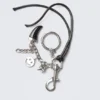 Multi-Charm Keyring – Metal/Black String Multi-Charm Keyring – Metal/Black String