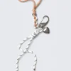 Multi-Charm Keyring – White/Beige String Multi-Charm Keyring – White/Beige String