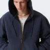 Relaxed Hooded Bomber Jacket – Washed Navy Blue Relaxed Hooded Bomber Jacket – Washed Navy Blue