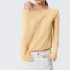 Relaxed Knitted Boat-Neck Sweater – Light Yellow Relaxed Knitted Boat-Neck Sweater – Light Yellow