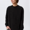 Relaxed Long-Sleeved T-Shirt – Black Relaxed Long-Sleeved T-Shirt – Black