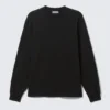 Relaxed Long-Sleeved T-Shirt – Black Relaxed Long-Sleeved T-Shirt – Black