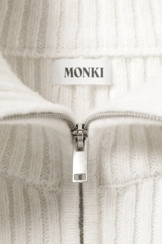 Rib Knit Peplum Zip Sweater – White Rib Knit Peplum Zip Sweater – White