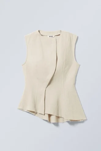 Sleeveless Asymmetric Peplum Top – Ecru