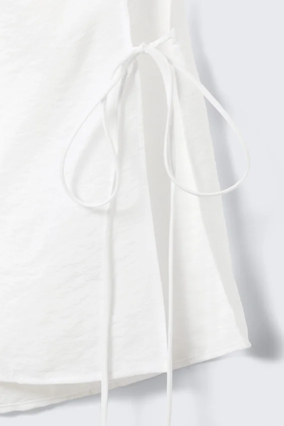 Sleeveless Boat-Neck Tie Top – White Sleeveless Boat-Neck Tie Top – White