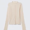 Slim Fit Long-Sleeved Mock-Neck Top – Beige Slim Fit Long-Sleeved Mock-Neck Top – Beige