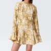 Slim Long-Sleeved Mini Flounce Dress – Yellow Floral Print Slim Long-Sleeved Mini Flounce Dress – Yellow Floral Print