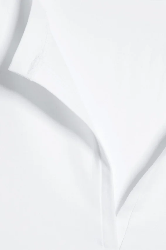 Slim V-Neck Sleeveless Top – White Slim V-Neck Sleeveless Top – White