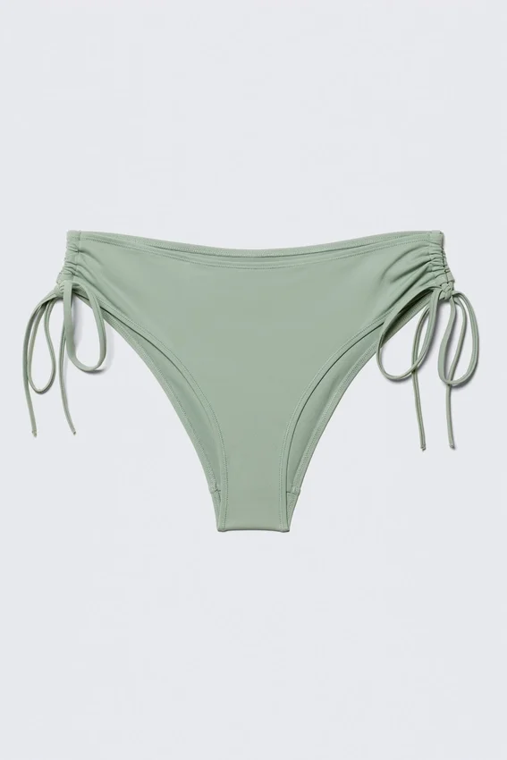 Strappy Side Tie Bikini Bottoms – Light Dusty Green Strappy Side Tie Bikini Bottoms – Light Dusty Green