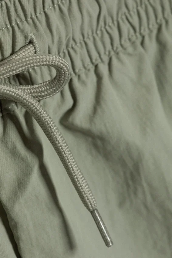 Structured Mid-Thigh Swim Shorts – Light Dusty Khaki Green Structured Mid-Thigh Swim Shorts – Light Dusty Khaki Green